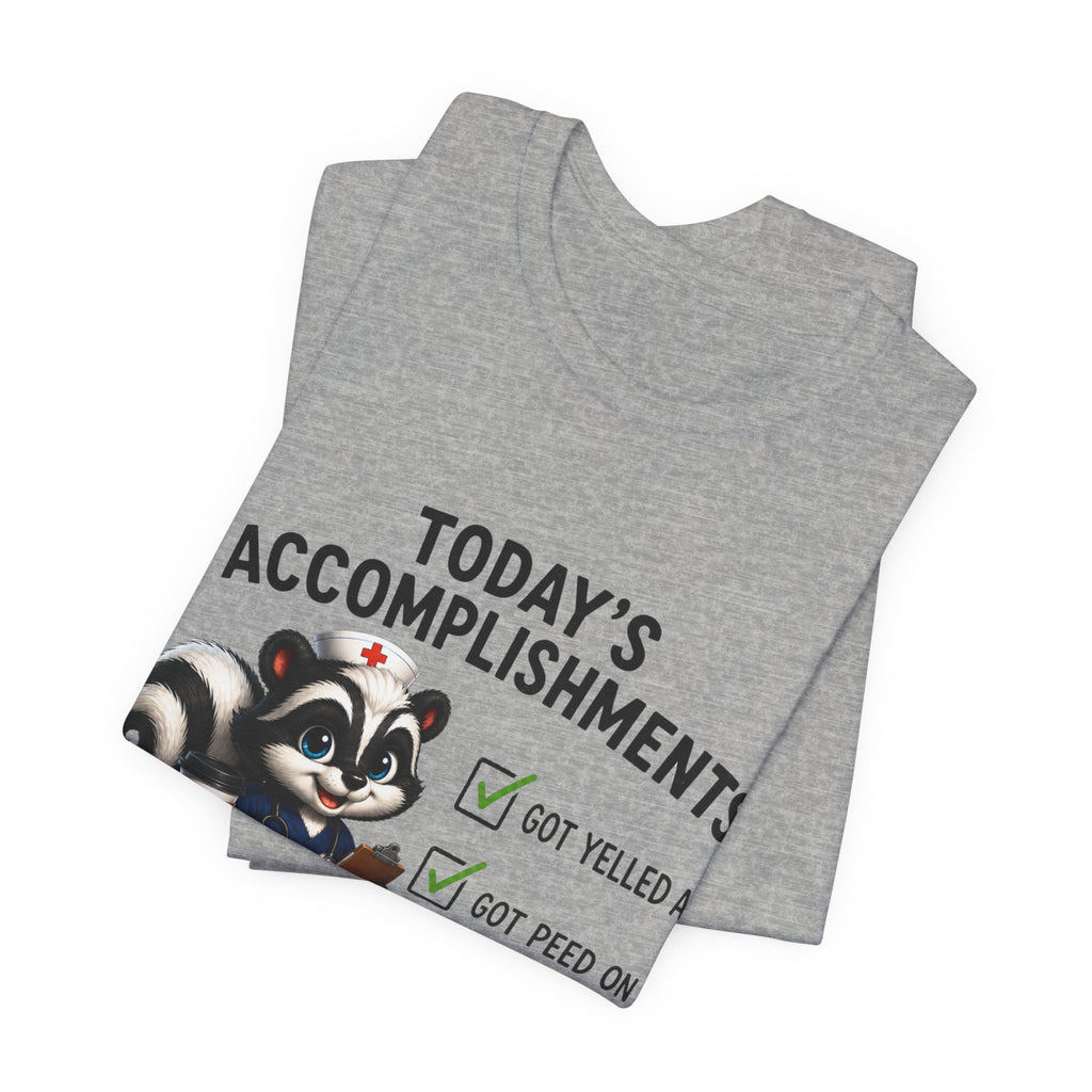 Tee — “Today’s Accomplishments: Got Yelled At, Got Peed On” Cute Skunk Checklist