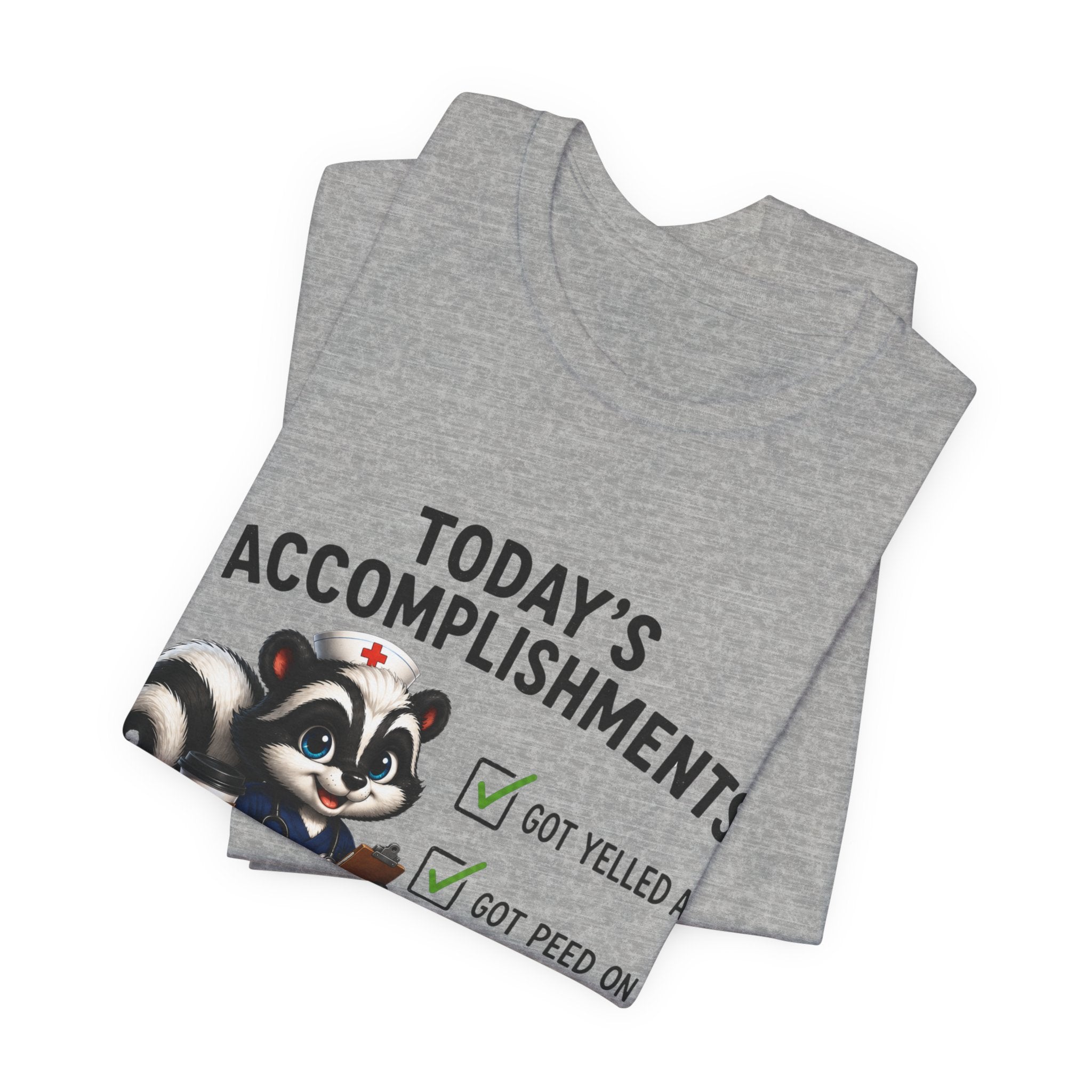 Tee — “Today’s Accomplishments: Got Yelled At, Got Peed On” Cute Skunk Checklist