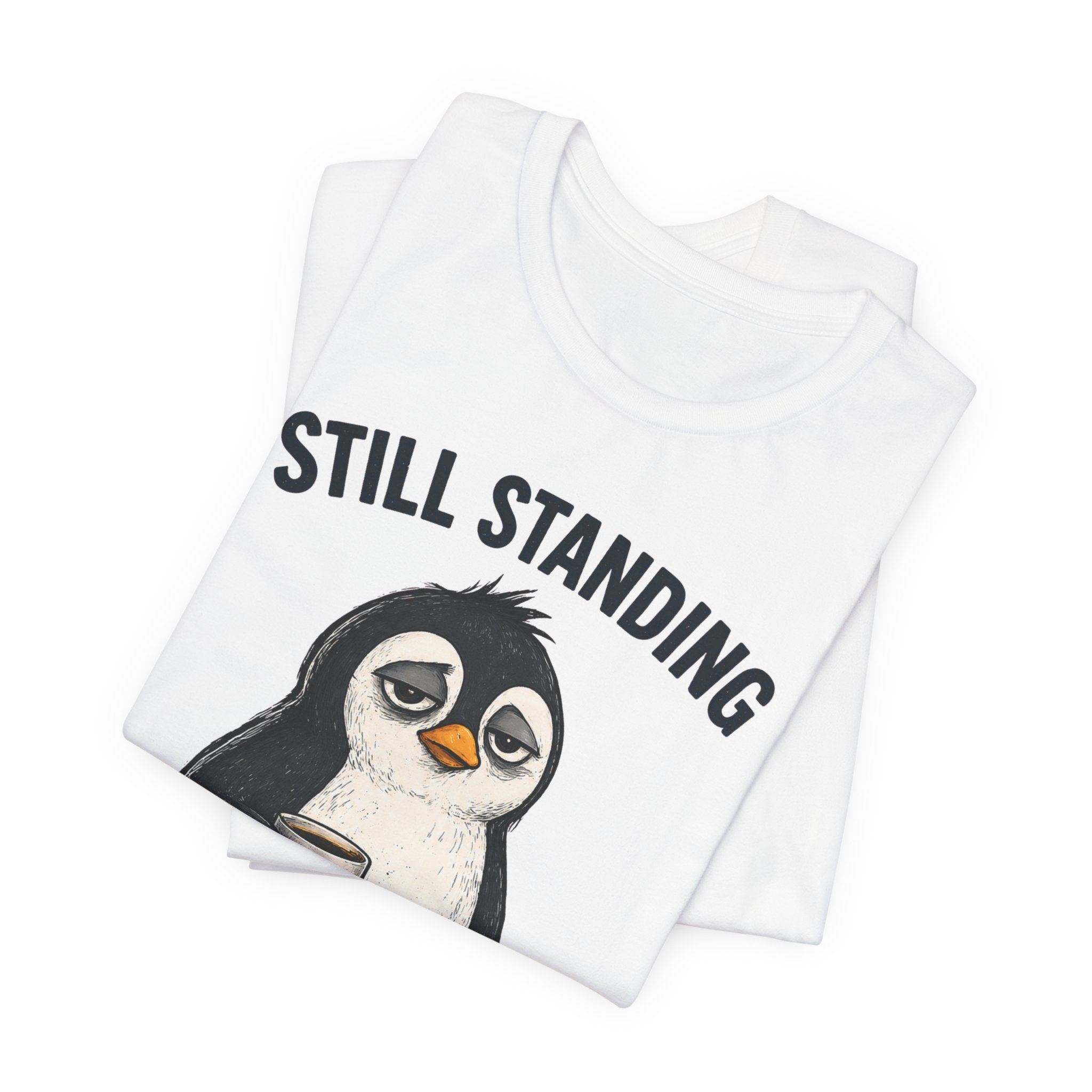 Still Standing Somehow Penguin T-Shirt – Cute Resilient Animal Graphic Tee