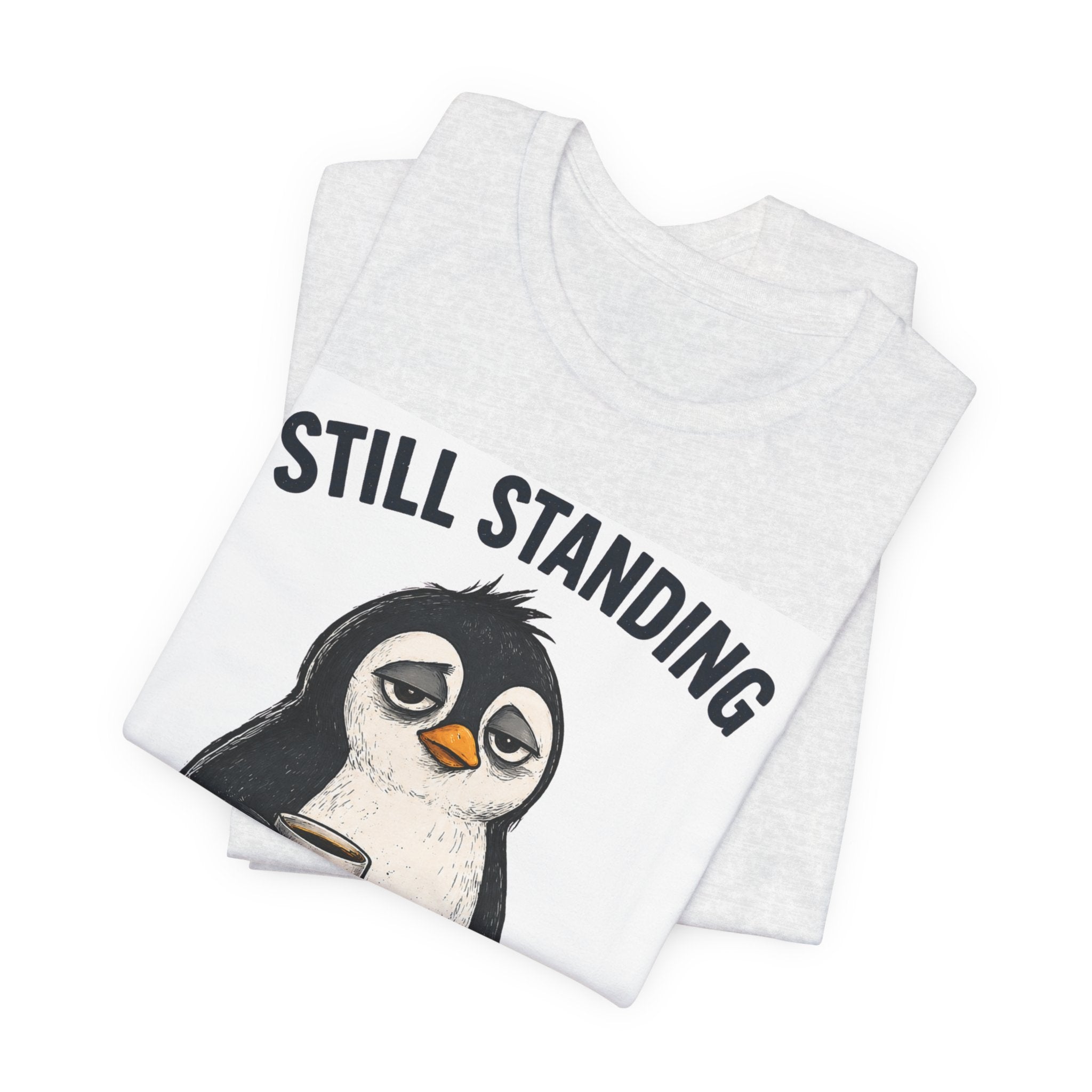 Still Standing Somehow Penguin T-Shirt – Cute Resilient Animal Graphic Tee
